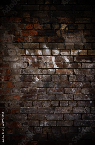 brick wall with graffiti