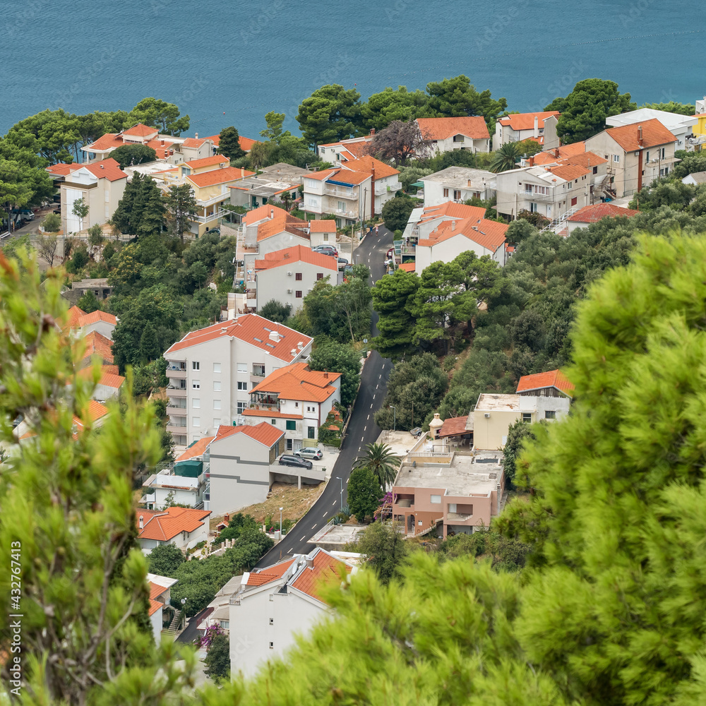 Top view at the coast road along residential buildings in Croatia