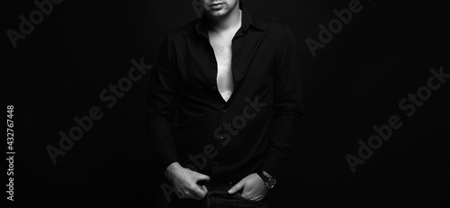 Man over black background. Handsome sexy Man © eugenepartyzan