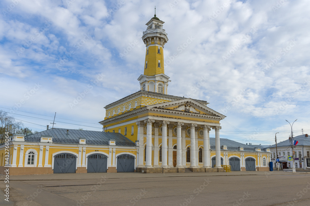 Fototapeta premium The old building of the fire station on a cloudy May morning. Kostroma, Golden Ring of Russia
