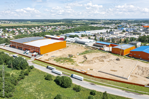 panoramic aerial view of distribution center at industrial logistic zone. drone photography