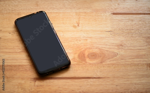 Smartphones on a wooden table,copy space