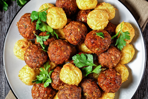 Italian meatballs and pasta balls on a plate