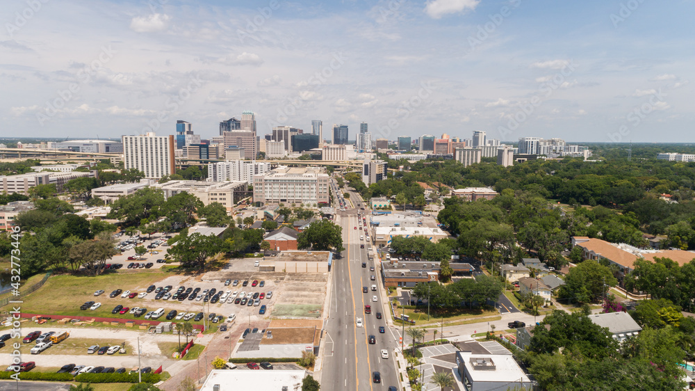 Aerial shot over Orange avenue facing downtown Orlando with ORMC hospital in the foreground.