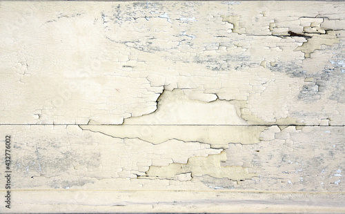 Ancient wooden planks with cracked paint