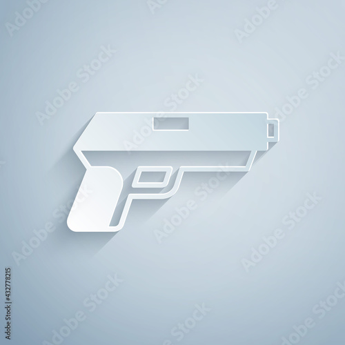 Paper cut Pistol or gun icon isolated on grey background. Police or military handgun. Small firearm. Paper art style. Vector