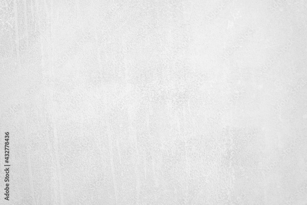 White paint on the gray cement wall texture background. White paint on the gray cement wall texture background.