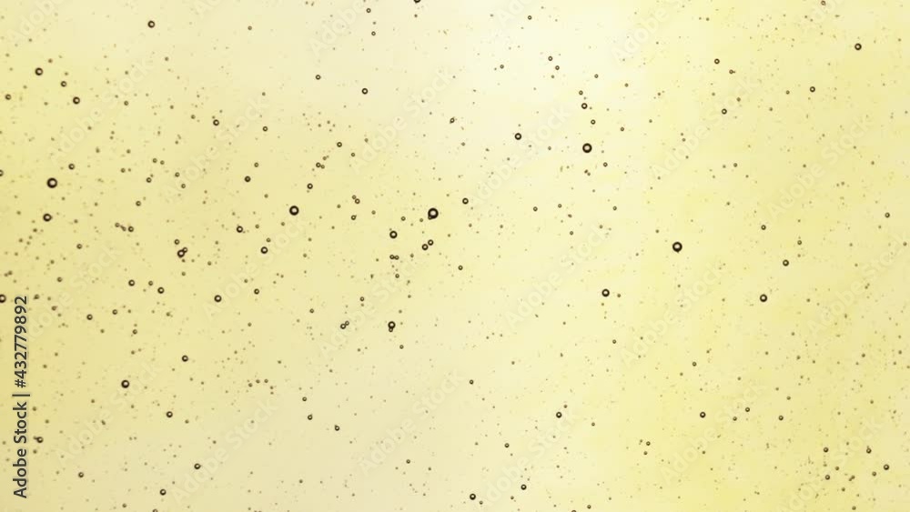 Fliessender Honig im Gegenlicht Fliessender Honig im Gegenlicht