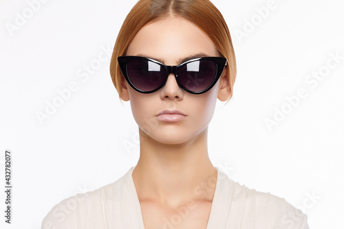 fashion portrait of beauty girl in sunglasses