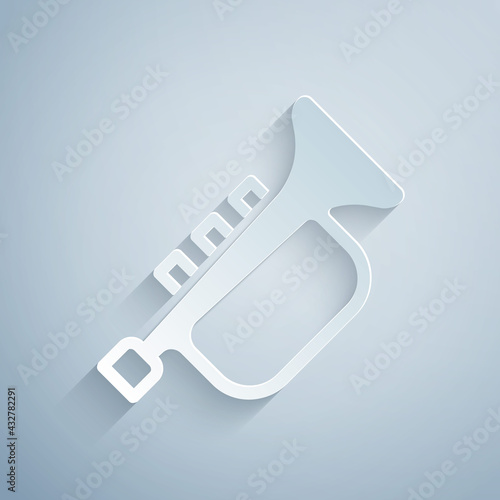 Paper cut Musical instrument trumpet icon isolated on grey background. Paper art style. Vector