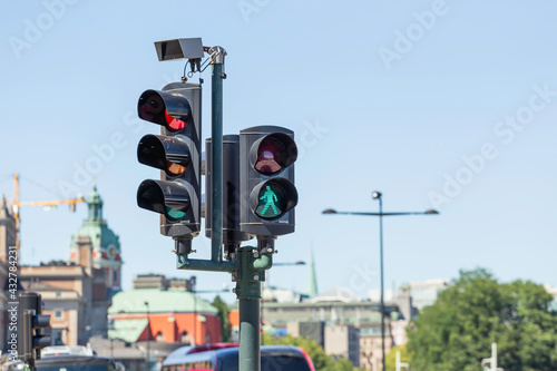Photography Traffic lights for cars and pedestrians on one of the central streets of Stockholm