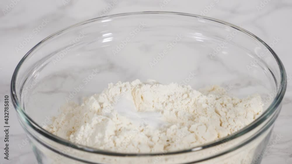 Time lapse. Step by step. Mixing ingredients into the batter for lemon pound cake. Time lapse. Step by step. Mixing ingredients into the batter for lemon pound cake.