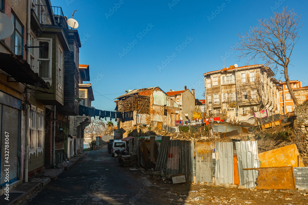 View of ramshackle houses in residential quarter Eminonu, Fatih district in Istanbul, Turkey. Shooting date 2021.