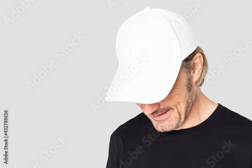 Fotografie Man in white cap for men's apparel shoot