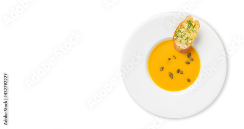 Top view, Pumpkin soup, and Garlic bread, is in white plate isolated on white background. With clipping path.