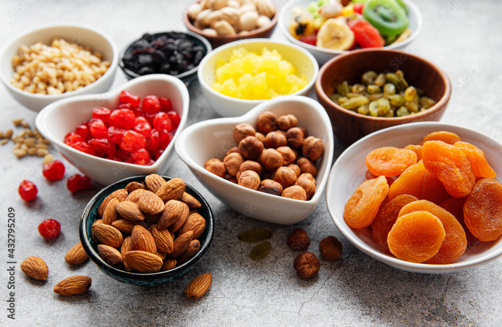 Bowls with various dried fruits and nuts Bowls with various dried fruits and nuts