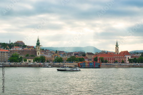 View of Buda Hill at sunset with a cloudy sky, Budapest, Hungary