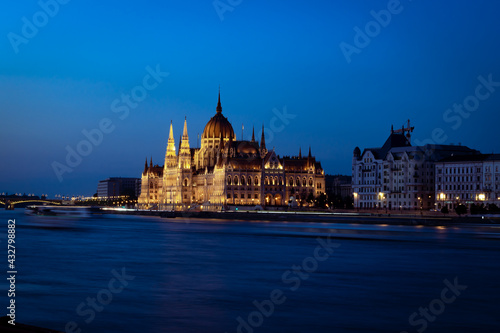 Beautiful building of Parliament in Budapest, Hungary, a popular travel destination at sunset © Nikolett