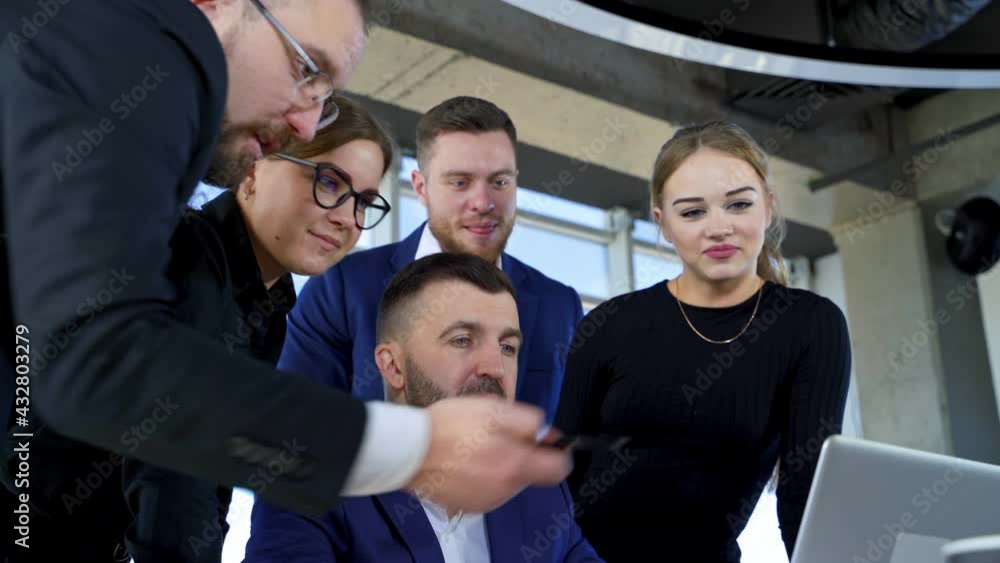 Group of happy young business people in a meeting at office. Teamwork, brainstorming concept. Group of happy young business people in a meeting at office. Teamwork, brainstorming concept.