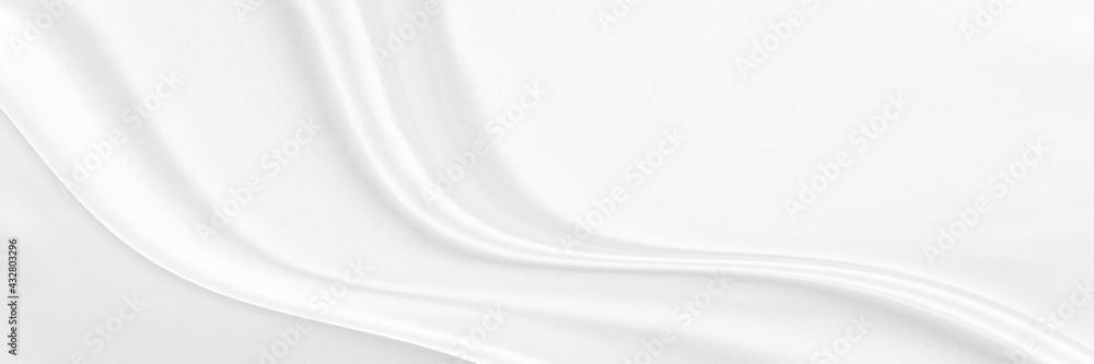 White gray satin texture that is white silver fabric silk panorama background with beautiful soft blur pattern natural.