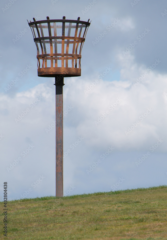 A Traditional Metal Fire Signal Beacon on a Country Hillside.