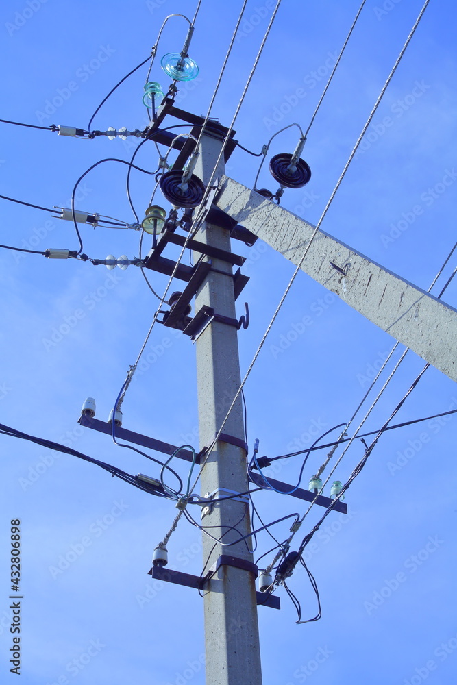 transmission line. Dielectrics. Traverses. against the blue sky.