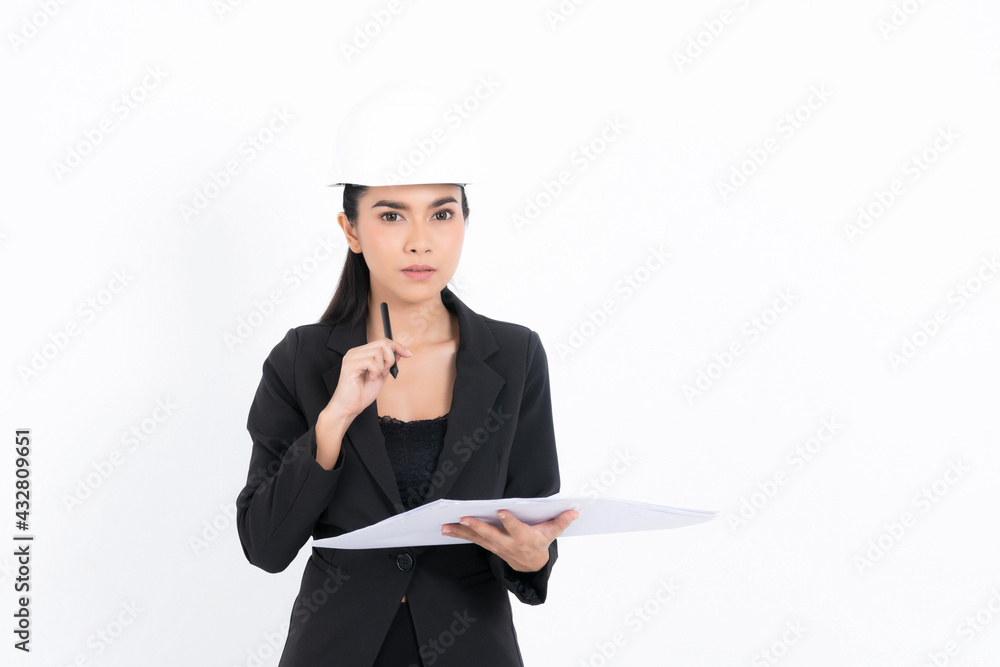 Portrait young engineer woman is submitting ideas about plans and projects, while holding blueprints and a pen in hand at shot studio isolated on white background. Portrait young engineer woman is submitting ideas about plans and projects, while holding blueprints and a pen in hand at shot studio isolated on white background.