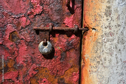 Rusted padlock on Lighthouse door.