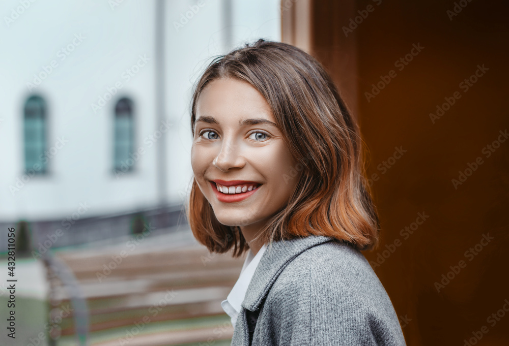 Beautiful elegant woman in the park in early spring Beautiful elegant woman in the park in early spring
