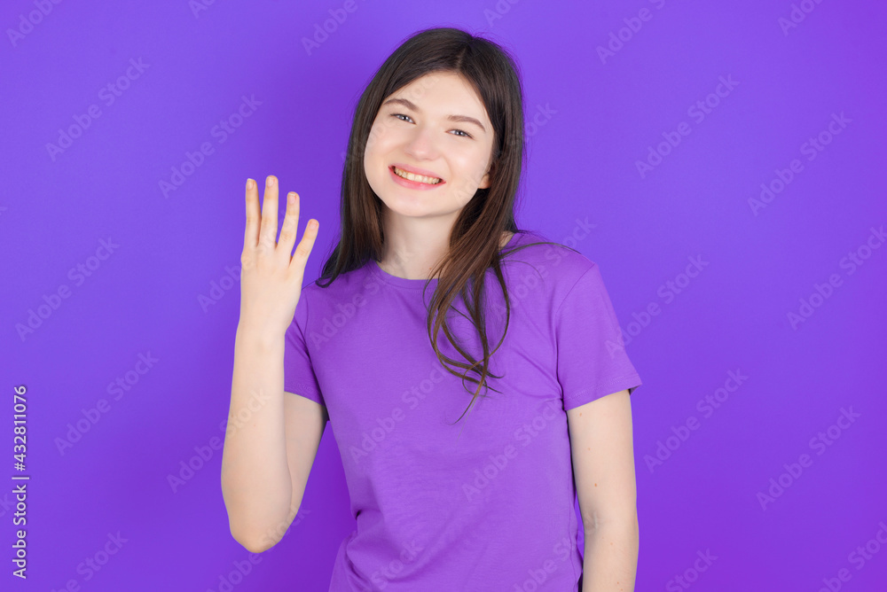 young beautiful Caucasian girl wearing purple T-shirt over purple background smiling and looking friendly, showing number four or fourth with hand forward, counting down young beautiful Caucasian girl wearing purple T-shirt over purple background smiling and looking friendly, showing number four or fourth with hand forward, counting down
