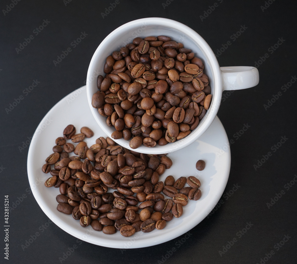 Coffee beans on a cup Coffee beans on a cup