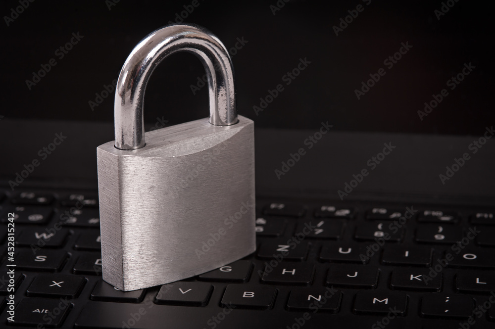 Cyber crime. Internet cyber security concept with a padlock on laptop computer. Ransomware, Malware, Encrypt and Hacking. Data security concept Cyber crime. Internet cyber security concept with a padlock on laptop computer. Ransomware, Malware, Encrypt and Hacking. Data security concept