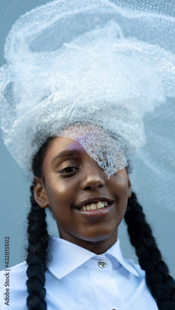 Portrait of Young Girl in Recycled Headdress Portrait of Young Girl in Recycled Headdress