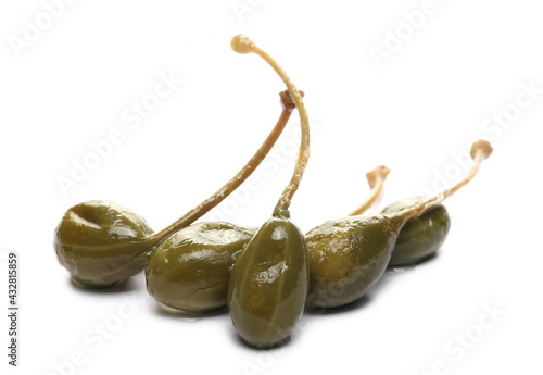 Capers (Capparis spinosa), edible flower buds pile isolated on white background