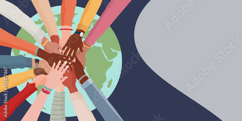People diversity. Arms and hands on top of each other on the globe. People of diverse race culture ethnicity and country. Integration.Coexistence.Multicultural society. Banner copy space photo