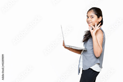 indian girl attending online school , due to cavide-19.