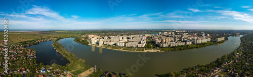 river Kuban and lake Brzhegokai near the city of Krasnodar in southern Russia on a sunny May morning - aerial very large panorama view. 