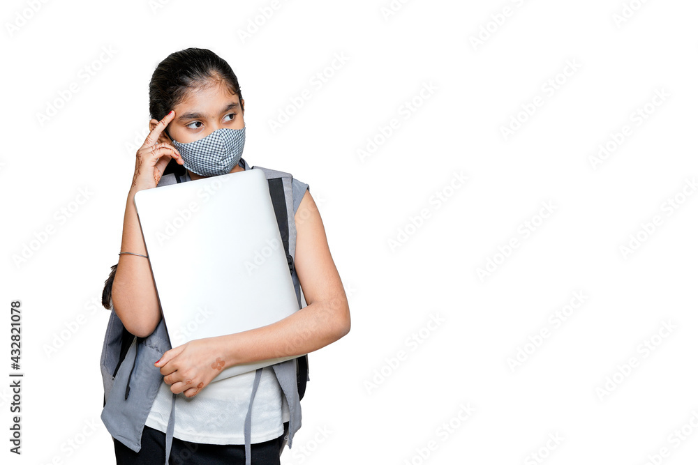 indian girl attending online school , due to cavide-19. indian girl attending online school , due to cavide-19.