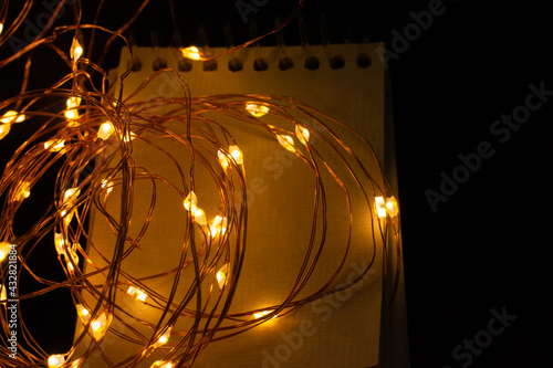 Colorful glowing  fairy light. Holiday festive xmas decoration. Christmas lights. photo