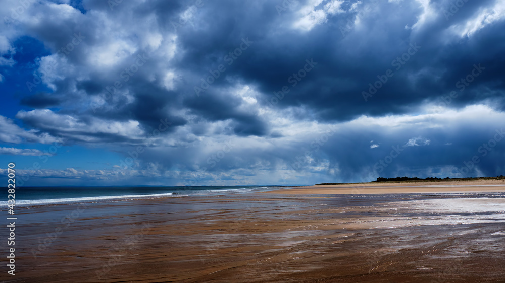 Rain clouds sweeping over Brora beach in Sutherland in the Highlands Rain clouds sweeping over Brora beach in Sutherland in the Highlands