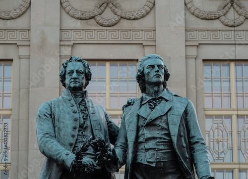 Sculpture statue of Johann Wolfgang Goethe and Friedrich Schiller in front of German National Theatre, Weimar Thuringia