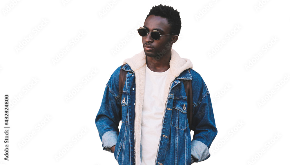 Fototapeta premium Portrait of stylish young african man model wearing denim jacket isolated on a white background