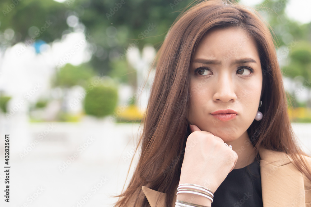 unhappy asian female office worker looking up, portrait of tired exhausted overworked business woman having problem with layoff, joblessness, unemployment, depression unhappy asian female office worker looking up, portrait of tired exhausted overworked business woman having problem with layoff, joblessness, unemployment, depression