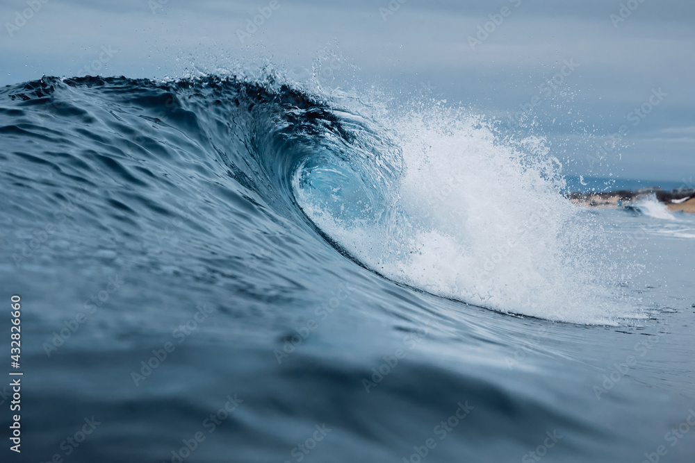 Surfing wave in ocean. Ideal waves for surfing Surfing wave in ocean. Ideal waves for surfing