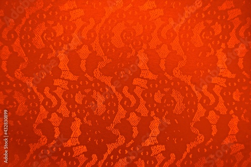 Orange lace pattern and tulle pattern. Stucco effect, classy elegant design, lacey floral texture and fun stylish background for announcements, advertising, print designs, holidays, party, event, etc.