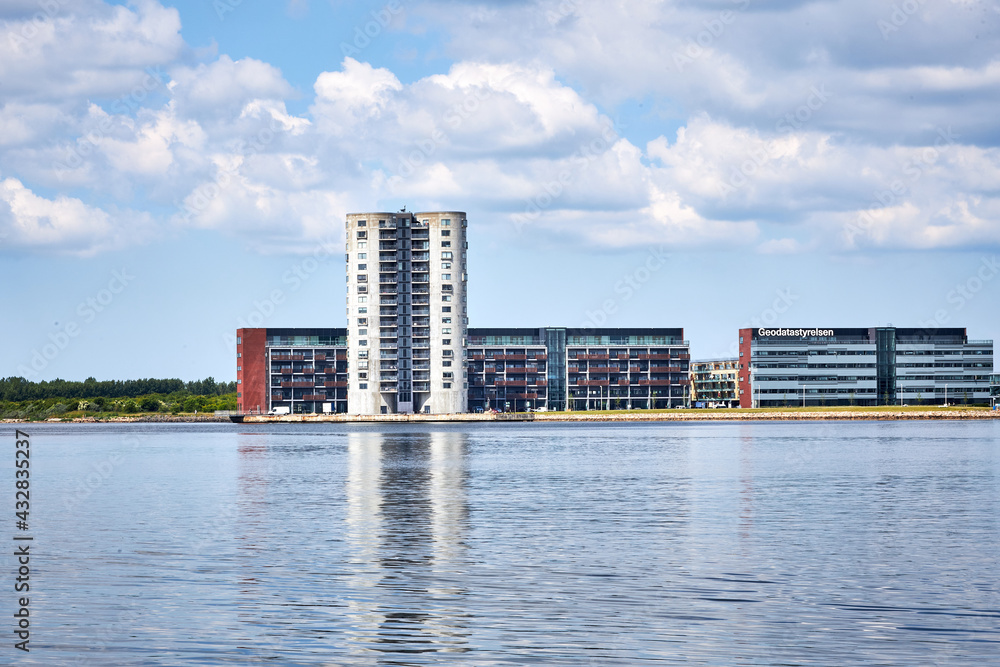 Fototapeta premium old tall and round building by the water in denmark