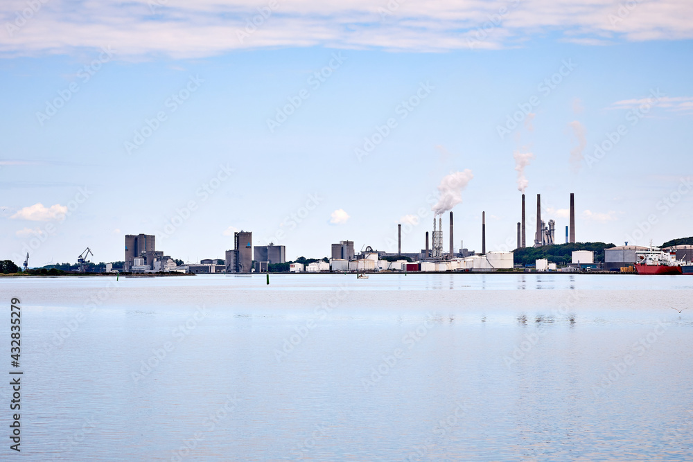 Naklejka premium harbor in denmark with clear blue water and ships