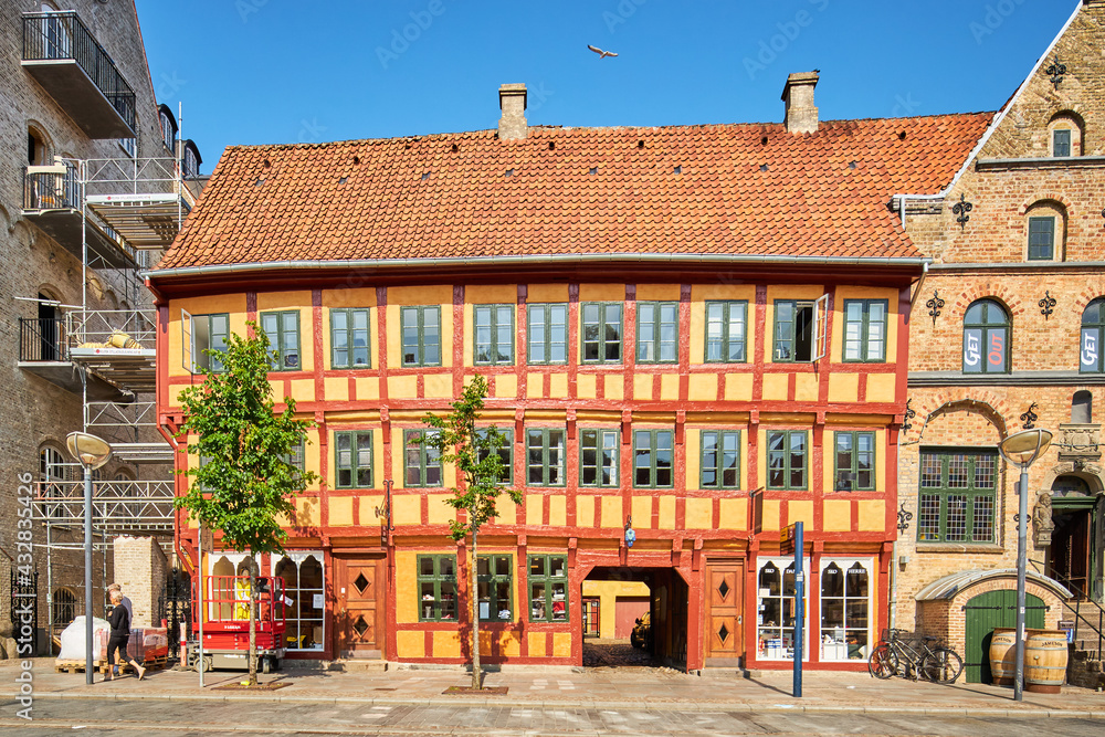 Fototapeta premium old traditional yellow and red building