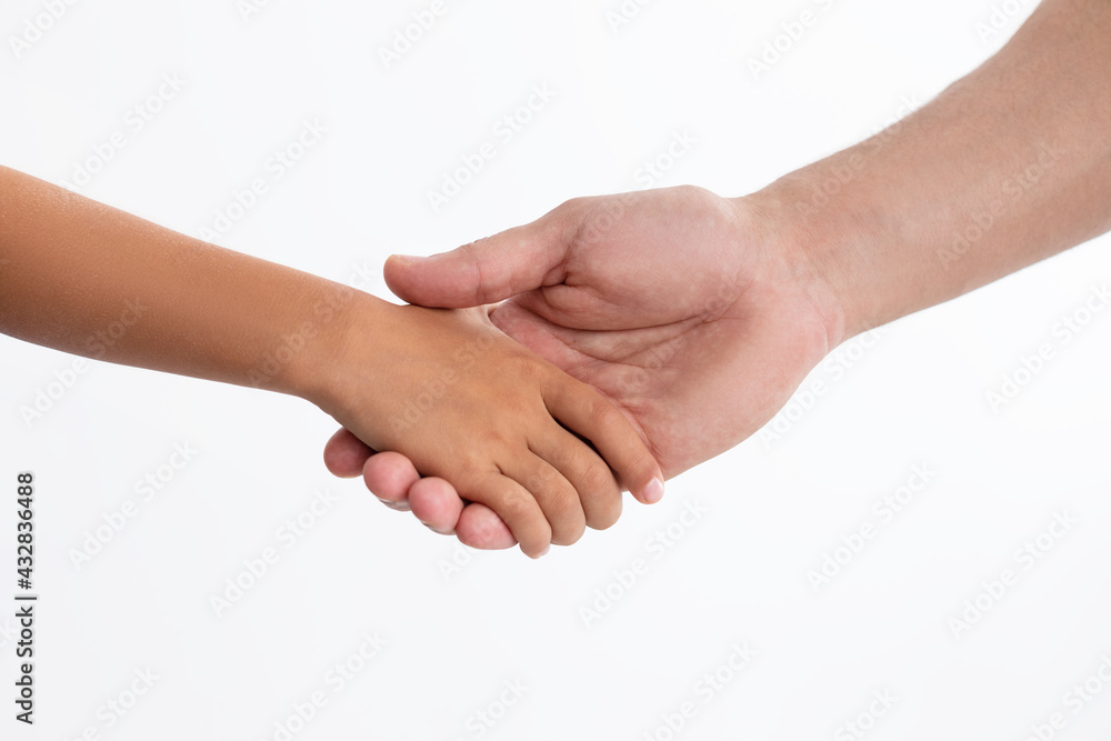 Closeup of father and daughter holding hands Closeup of father and daughter holding hands