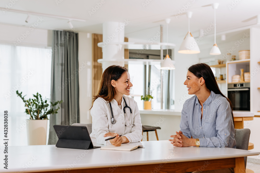 Patient and doctor talking at medicine office.